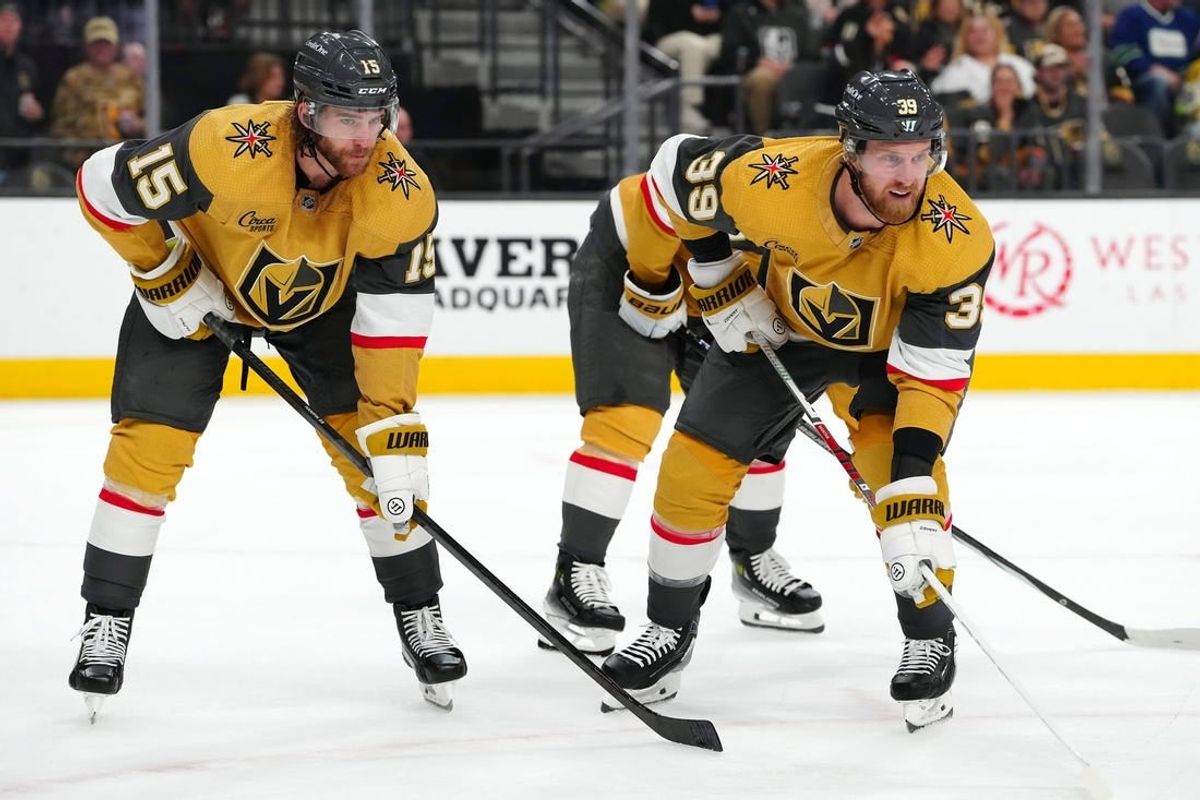 Mar 7, 2024; Las Vegas, Nevada, USA; Vegas Golden Knights defenseman Noah Hanifin (15) and Vegas Golden Knights right wing Anthony Mantha (39) await a face off against the Vancouver Canucks during the first period at T-Mobile Arena.