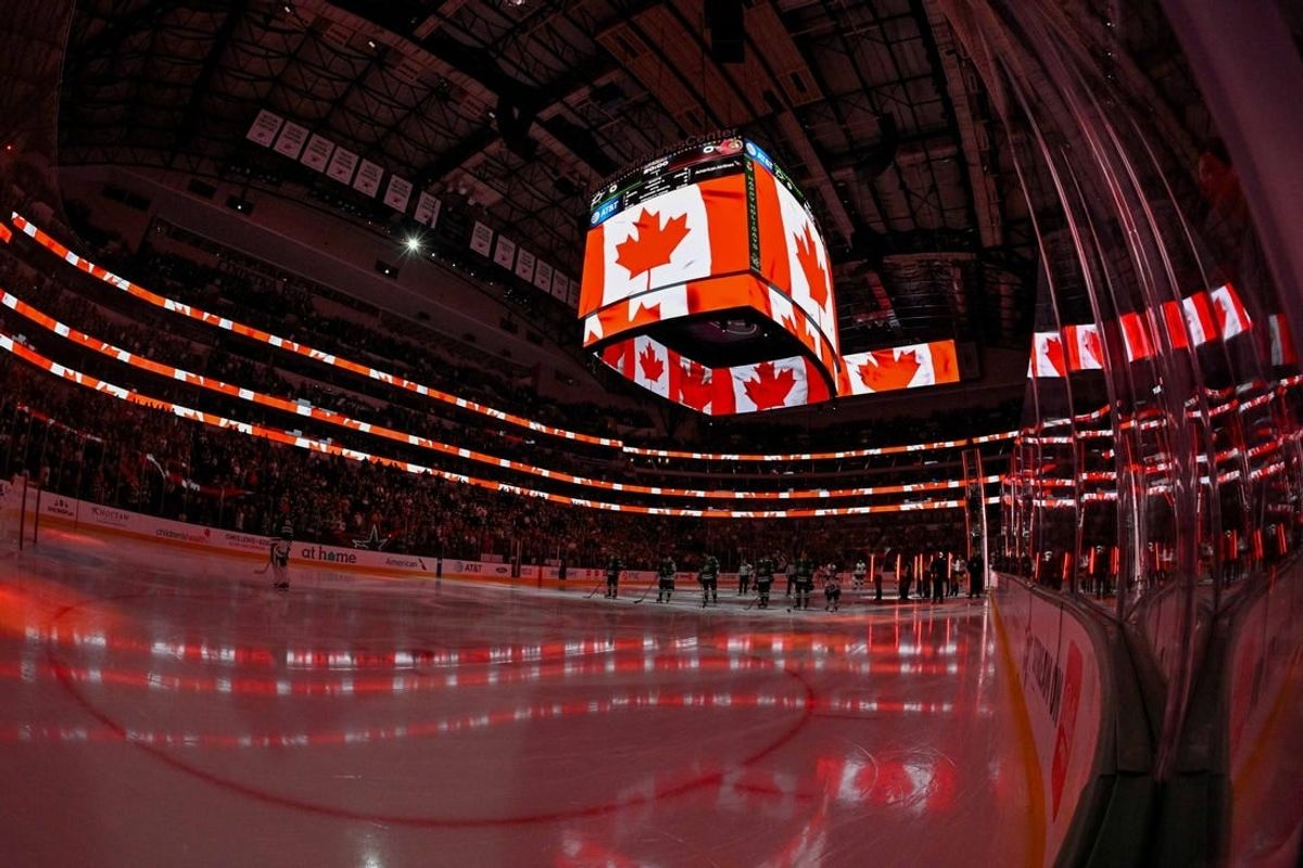 Dec 15, 2023; Dallas, Texas, USA; A view of the Canadian flag during the playing of the national anthem of Canada before the game between the Dallas Stars and the Ottawa Senators at the American Airlines Center.