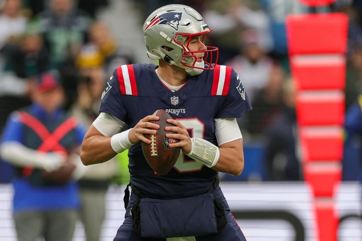Nov 12, 2023; Frankfurt, Germany;  New England Patriots quarterback Mac Jones (10) drops back to pass against the Indianapolis Colts in the first quarter during an International Series game at Deutsche Bank Park.