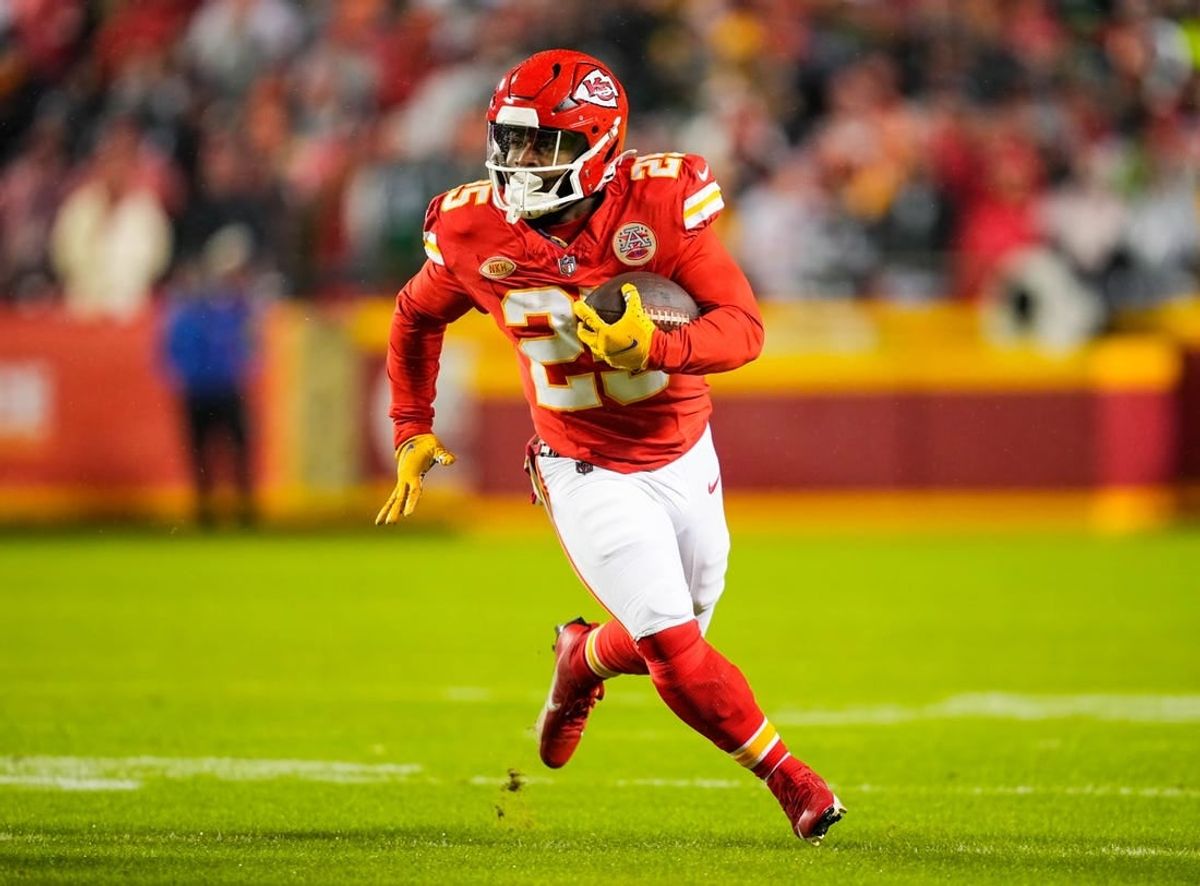Nov 20, 2023; Kansas City, Missouri, USA; Kansas City Chiefs running back Clyde Edwards-Helaire (25) runs the ball during the first half against the Philadelphia Eagles at GEHA Field at Arrowhead Stadium.