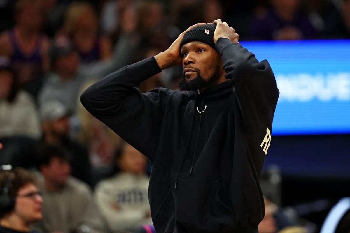 Jan 3, 2024; Phoenix, Arizona, USA; Phoenix Suns forward Kevin Durant (35) reacts from the bench during the fourth quarter of the game against the LA Clippers at Footprint Center.