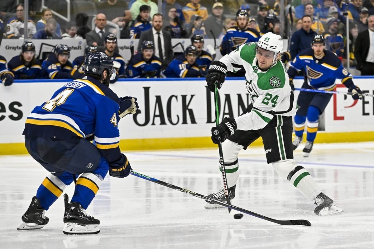 Dec 27, 2023; St. Louis, Missouri, USA;  Dallas Stars center Roope Hintz (24) shoots against the St. Louis Blues during the third period at Enterprise Center.