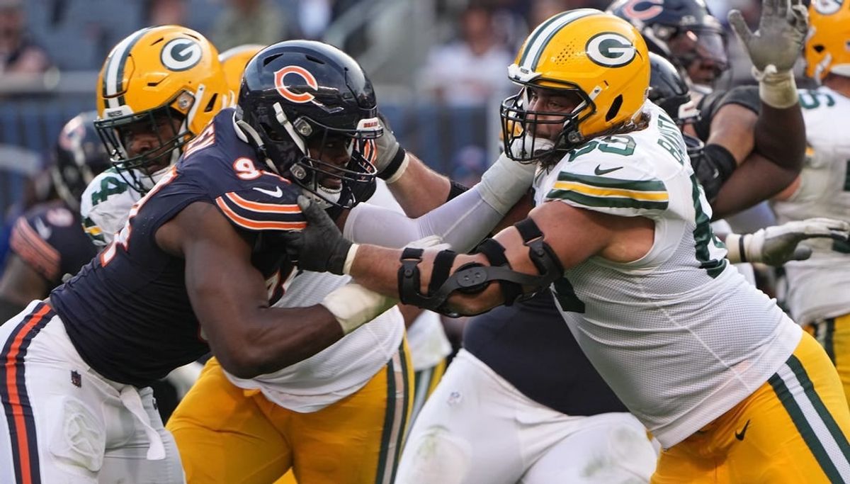 Sep 10, 2023; Chicago, Illinois, USA; Green Bay Packers offensive tackle David Bakhtiari (69) blocks Chicago Bears defensive end Rasheem Green (94) during the fourth quarter of their regular season opening game at Soldier Field.