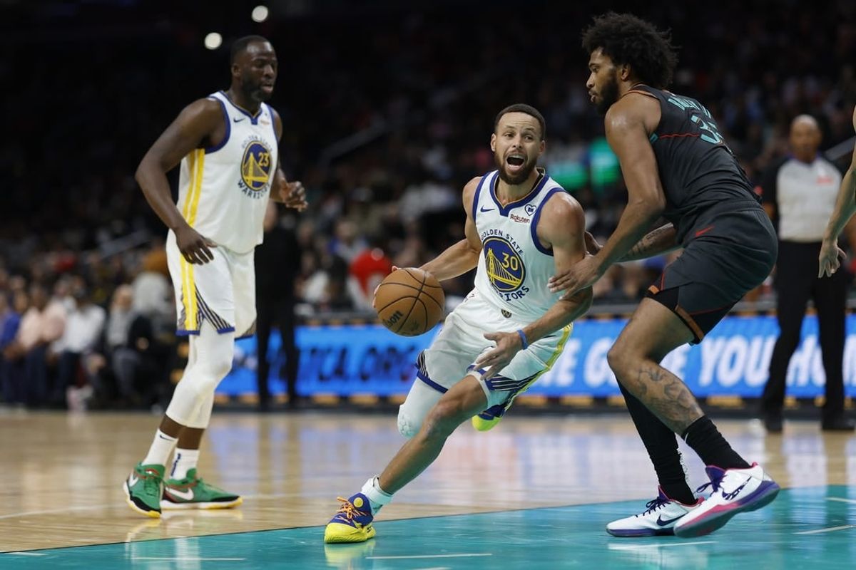 Feb 27, 2024; Washington, District of Columbia, USA; Golden State Warriors guard Stephen Curry (30) drives to the basket as Washington Wizards forward Marvin Bagley III (35) defends in the second half at Capital One Arena.