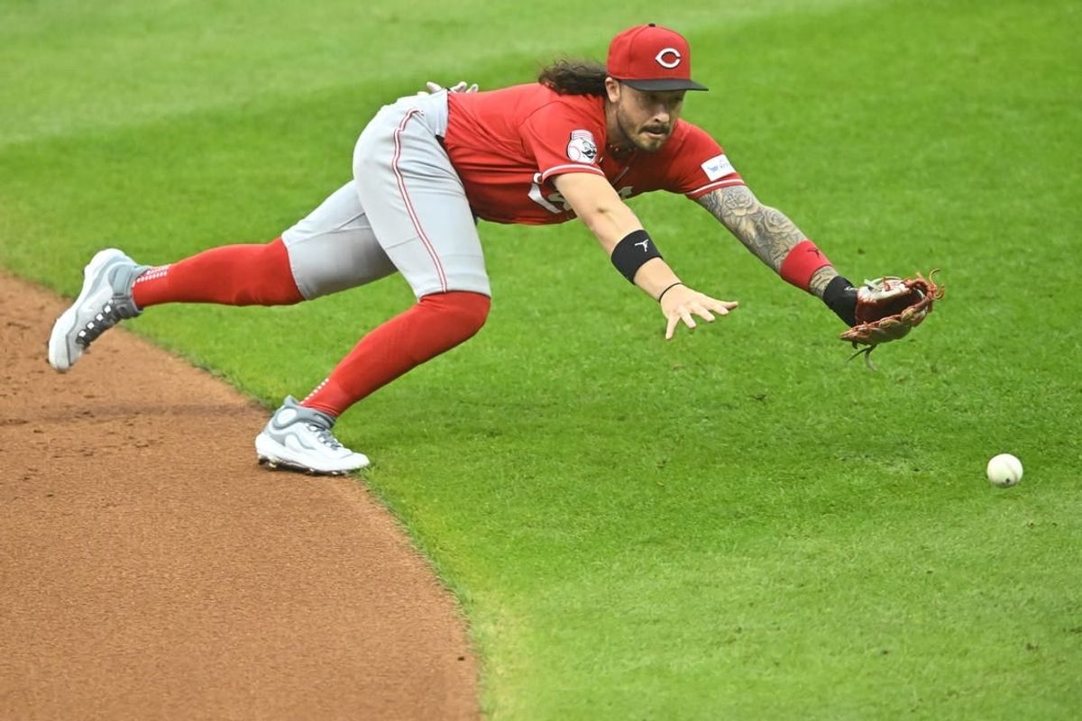 Sep 26, 2023; Cleveland, Ohio, USA; Cincinnati Reds second baseman Jonathan India (6) dives for the ball on a base hit by the Cleveland Guardians in the second inning at Progressive Field.