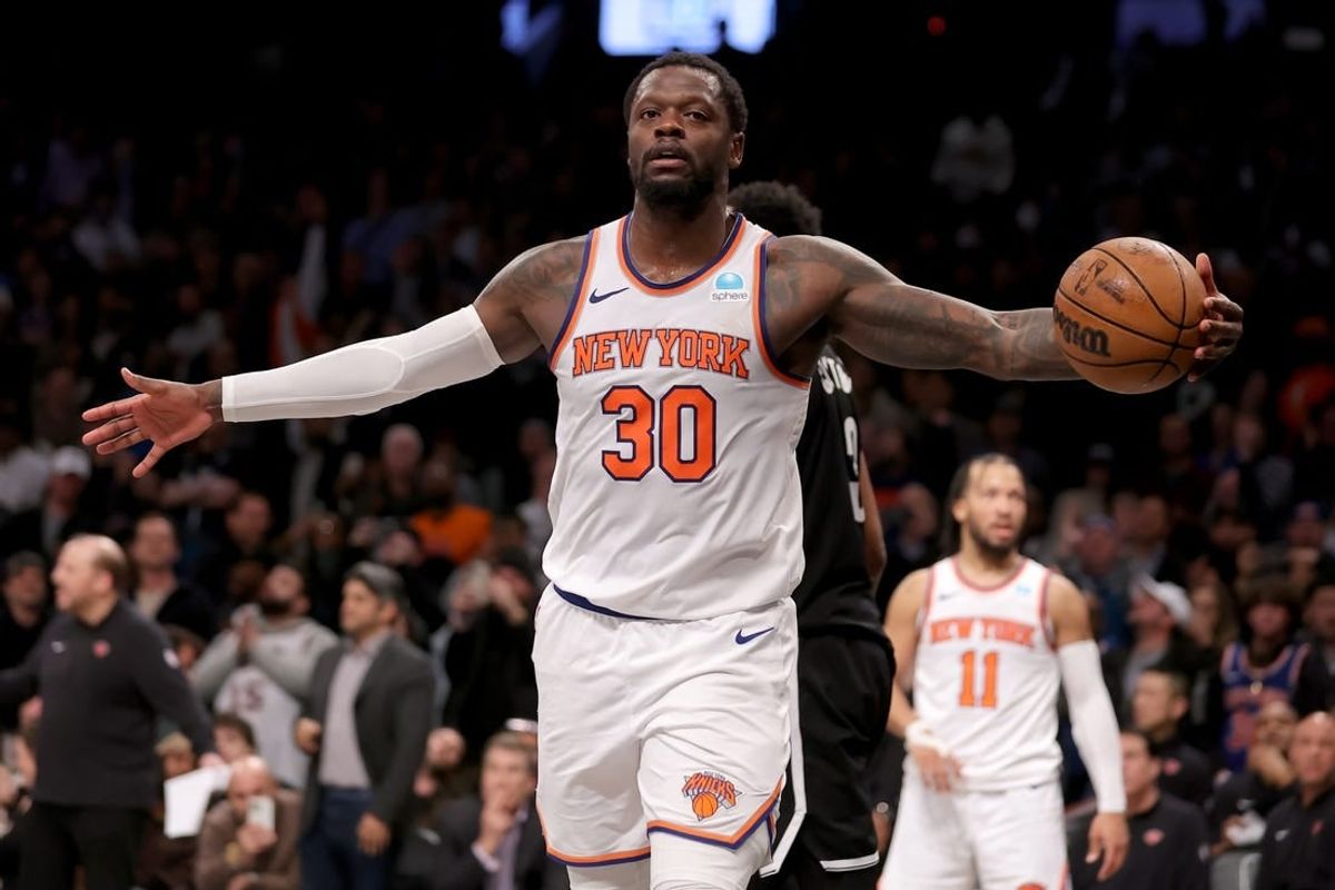 Jan 23, 2024; Brooklyn, New York, USA; New York Knicks forward Julius Randle (30) reacts during the fourth quarter against the Brooklyn Nets at Barclays Center.