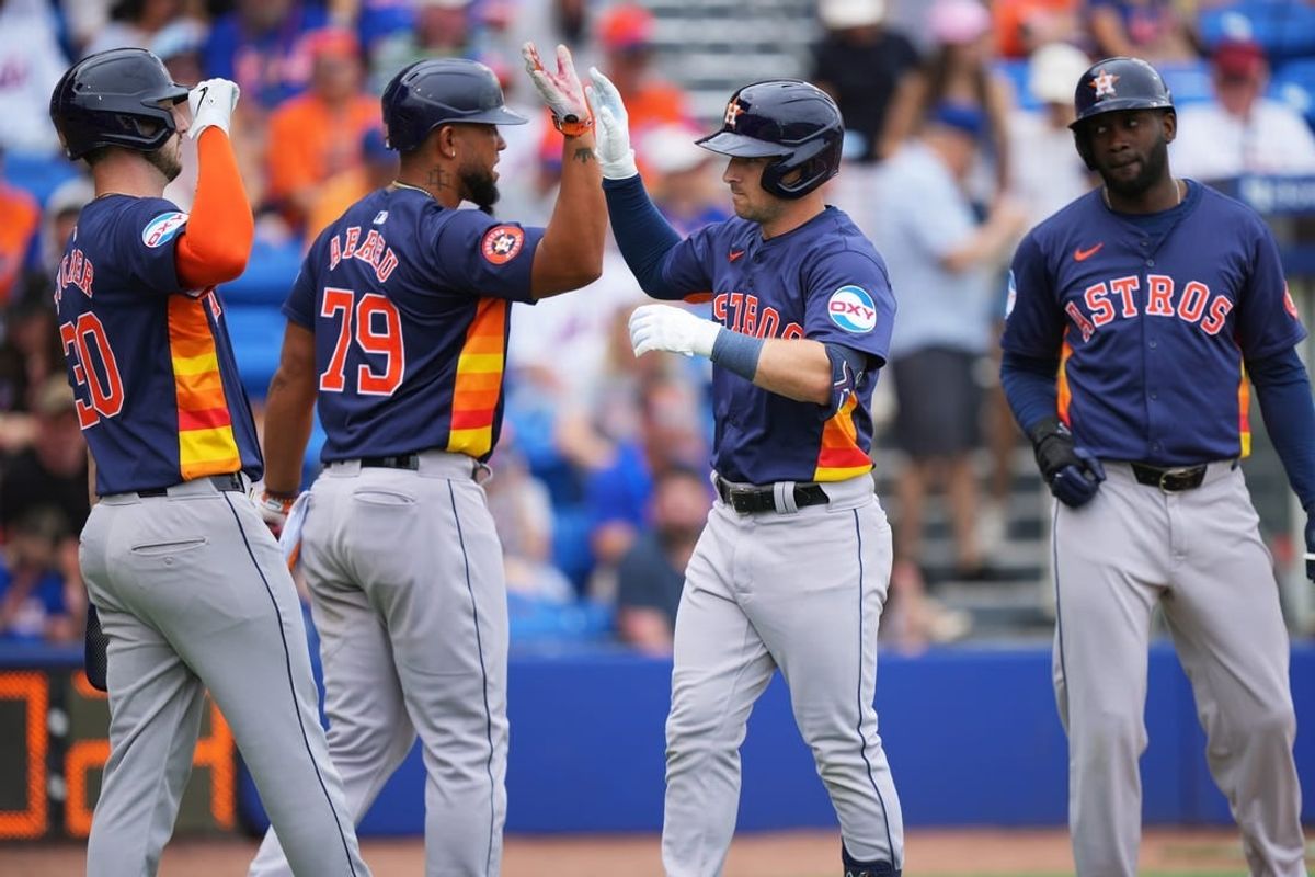 Mar 23, 2024; Port St. Lucie, Florida, USA;  Houston Astros third baseman Alex Bregman, center, is congratulated by first baseman Jose Abreu (79), right fielder Kyle Tucker (30) and designated hitter Yordan Alvarez, right, after hitting a three-run home run in the first inning against the New York Mets at Clover Park.