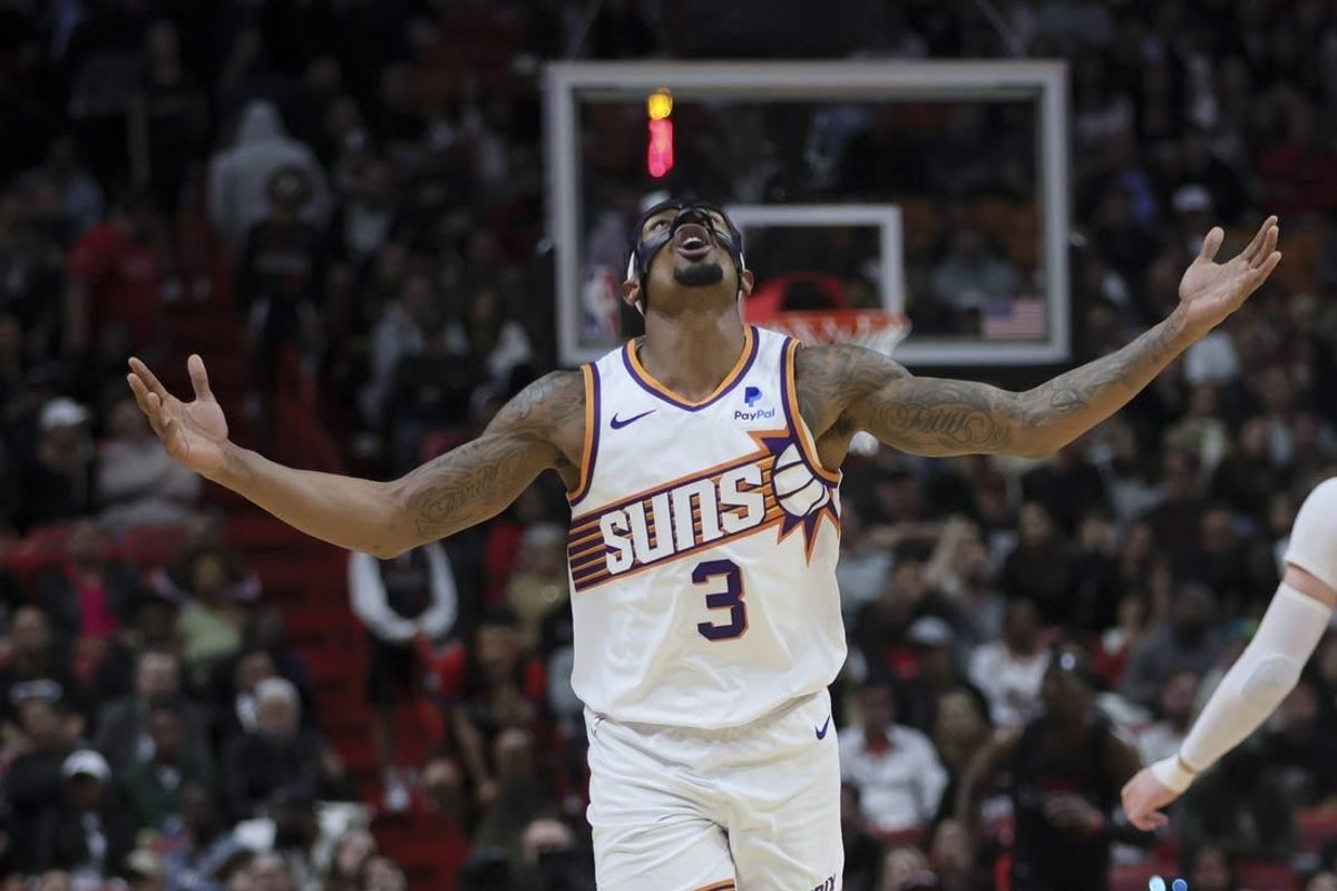 Jan 29, 2024; Miami, Florida, USA; Phoenix Suns guard Bradley Beal (3) reacts after scoring against the Miami Heat during the fourth quarter at Kaseya Center.