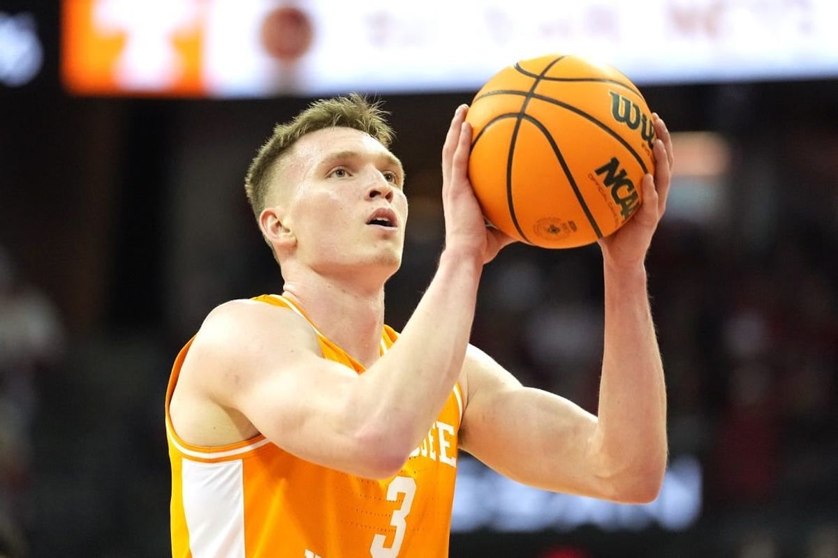 Nov 10, 2023; Madison, Wisconsin, USA; Tennessee Volunteers guard Dalton Knecht (3) shoots a free throw during the first half against the Wisconsin Badgers at the Kohl Center.