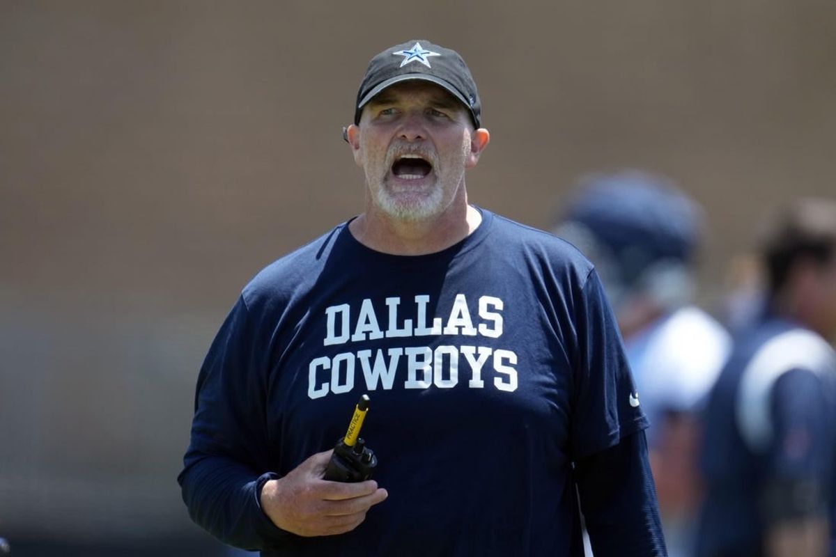 Jul 29, 2023; Oxnard, CA, USA; Dallas Cowboys defensive coordinator Dan Quinn reacts during training camp at the River Ridge Fields.