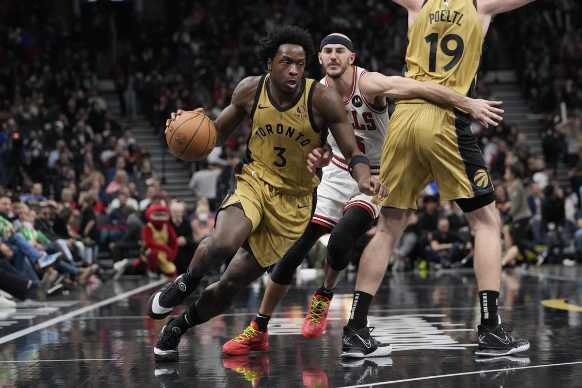Nov 24, 2023; Toronto, Ontario, CAN; Toronto Raptors forward O.G. Anunoby (3) drives to the basket as Chicago Bulls guard Alex Caruso (6) pursues during the first half at Scotiabank Arena.