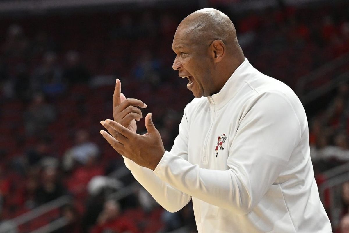 Dec 13, 2023; Louisville, Kentucky, USA; Louisville Cardinals head coach Kenny Payne shouts instructions during the first half against the Arkansas State Red Wolves at KFC Yum! Center. Arkansas State defeated Louisville 75-63.