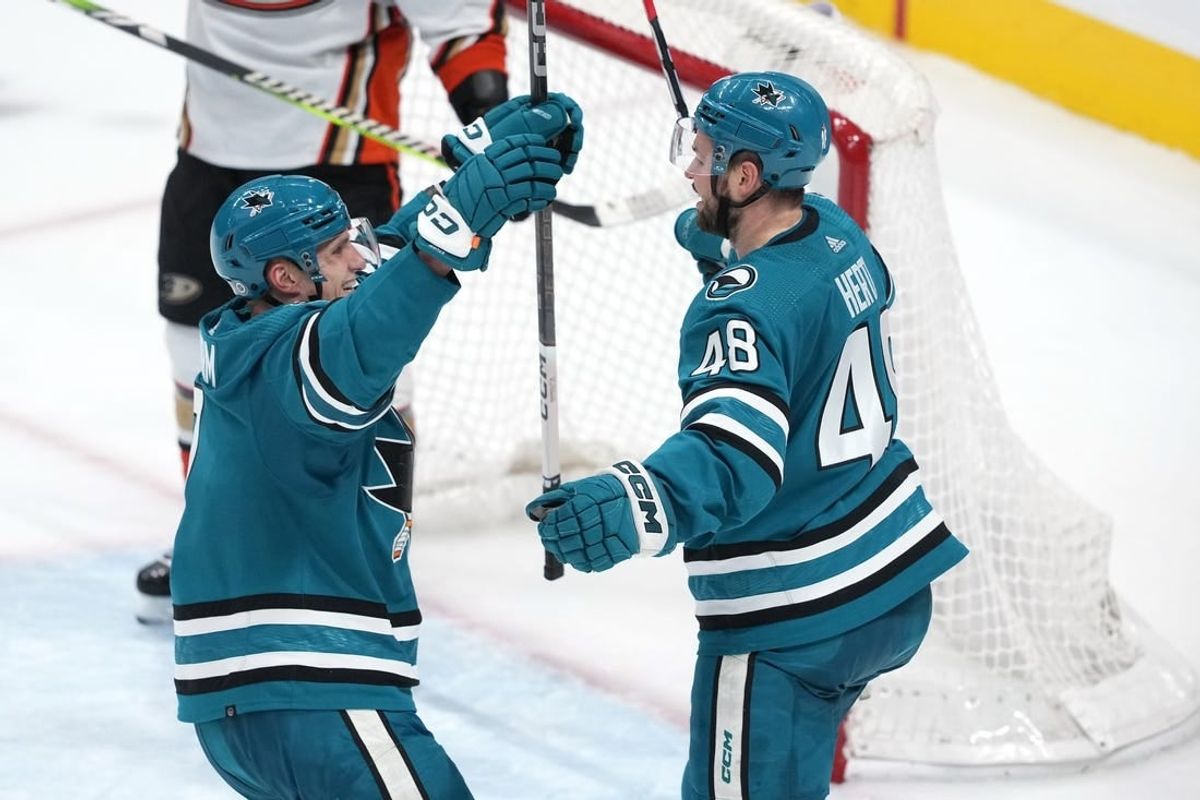 Jan 20, 2024; San Jose, California, USA; San Jose Sharks center Tomas Hertl (48) is congratulated by center Nico Sturm (left) after scoring a goal against the Anaheim Ducks during the third period at SAP Center at San Jose.