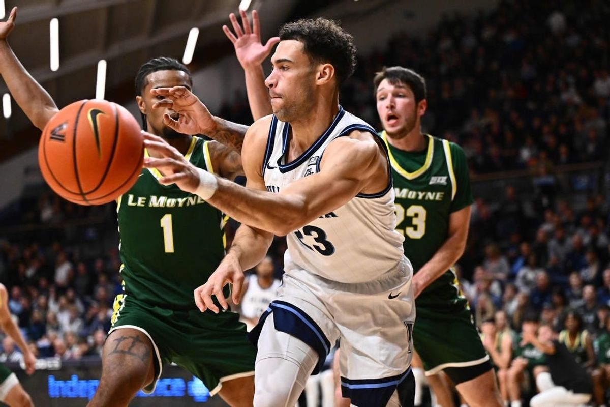 Nov 10, 2023; Villanova, Pennsylvania, USA; Villanova Wildcats forward Tyler Burton (23) passes the ball against the Le Moyne Dolphins in the first half at William B. Finneran Pavilion.