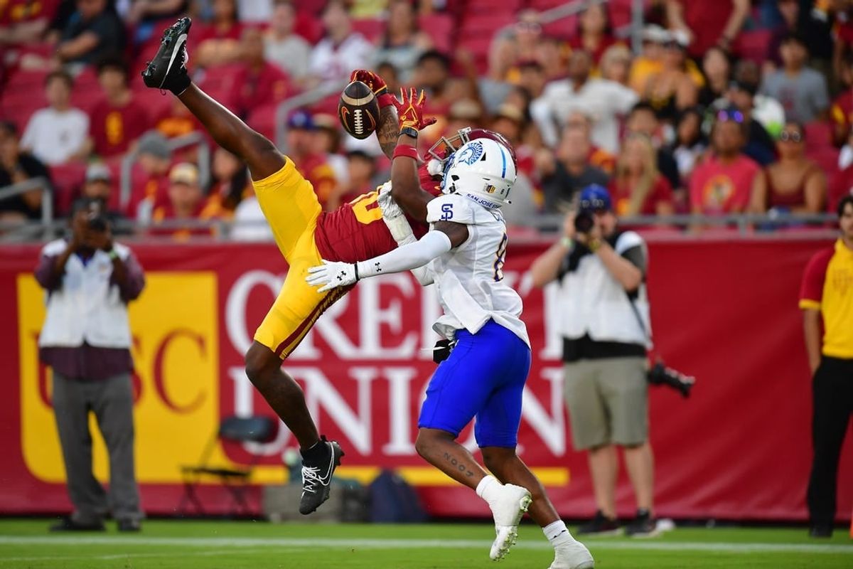 zAug 26, 2023; Los Angeles, California, USA; Southern California Trojans wide receiver Kyron Hudson (10) is unable to control the ball against San Jose State Spartans cornerback Jay'Vion Cole (8) during the second half at Los Angeles Memorial Coliseum.