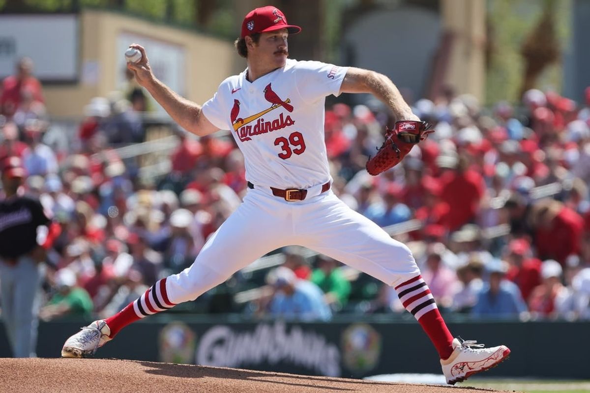 Mar 11, 2024; Jupiter, Florida, USA; St. Louis Cardinals starting pitcher Miles Mikolas (39) delivers a pitch against the Washington Nationals during the first inning at Roger Dean Chevrolet Stadium.