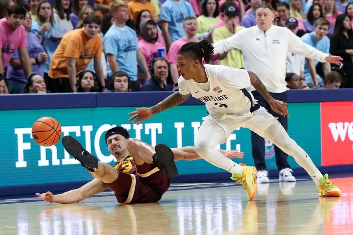 Jan 27, 2024; University Park, Pennsylvania, USA; Minnesota Golden Gophers forward Dawson Garcia (3) loses control of the ball as Penn State Nittany Lions guard Nick Kern Jr (3) chases after the ball during the first half at Bryce Jordan Center.