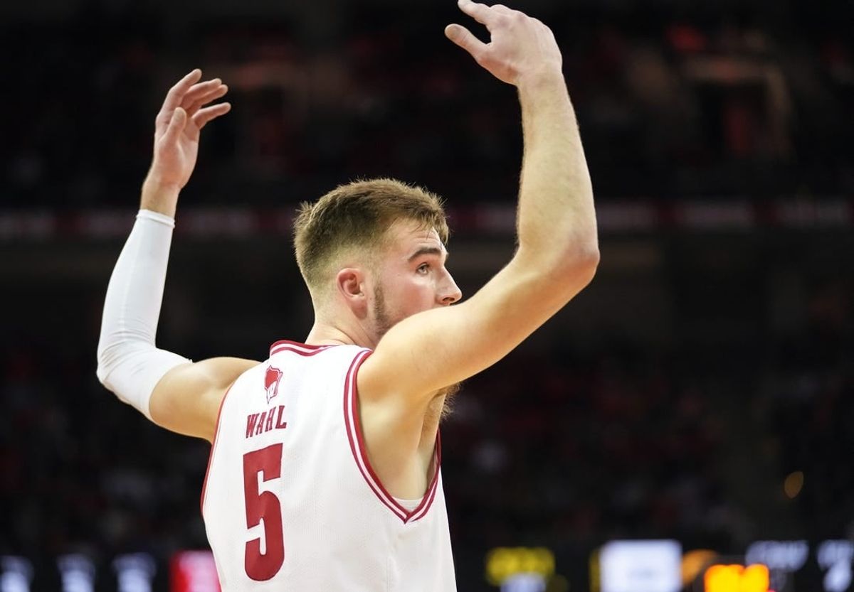 Jan 2, 2024; Madison, Wisconsin, USA;  Wisconsin Badgers forward Tyler Wahl (5) motions to the crowd during the first half against the Iowa Hawkeyes at the Kohl Center.