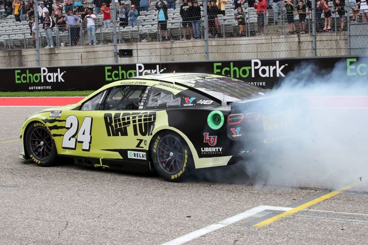 Mar 24, 2024; Austin, Texas, USA;  NASCAR Cup Series driver William Byron (24) performs a burn out after winning the EchoPark Automotive Grand Prix at Circuit of the Americas.