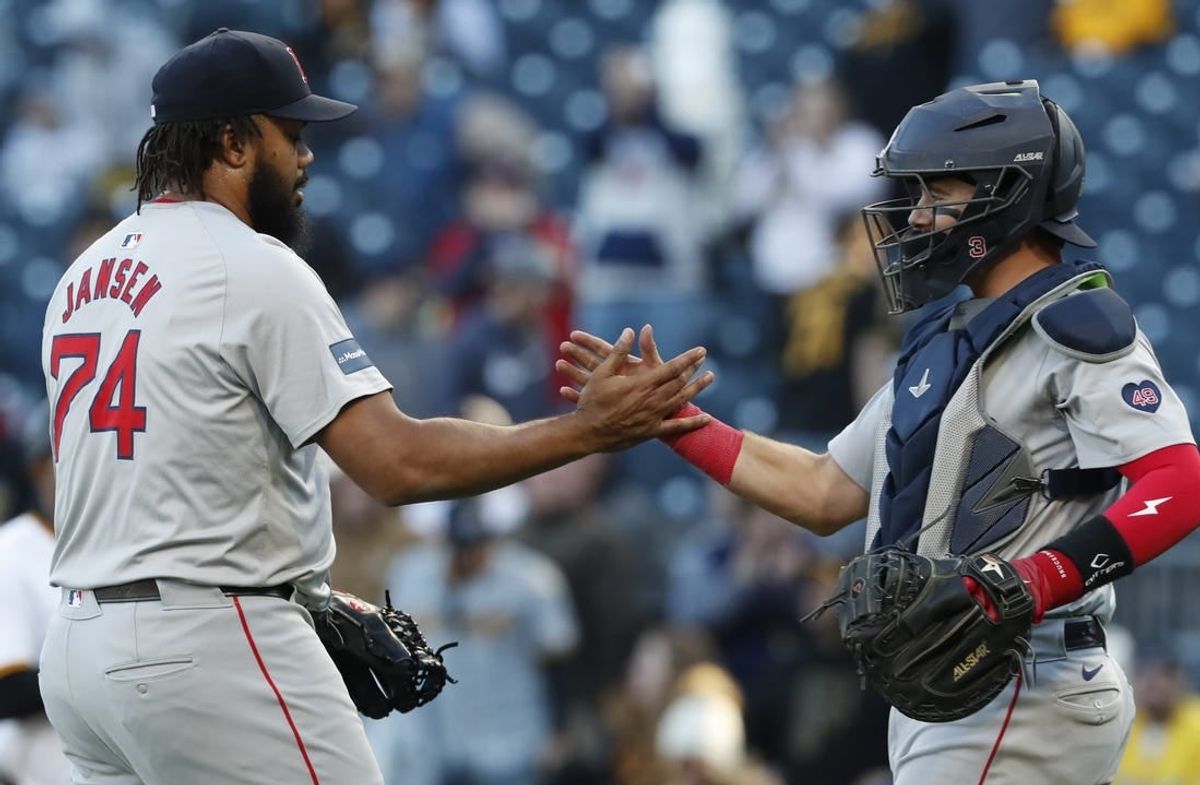 Apr 20, 2024; Pittsburgh, Pennsylvania, USA;  Boston Red Sox relief pitcher Kenley Jansen (74) and catcher Reese McGuire (3) celebrate after defeating the Pittsburgh Pirates at PNC Park. Boston won 4-2.