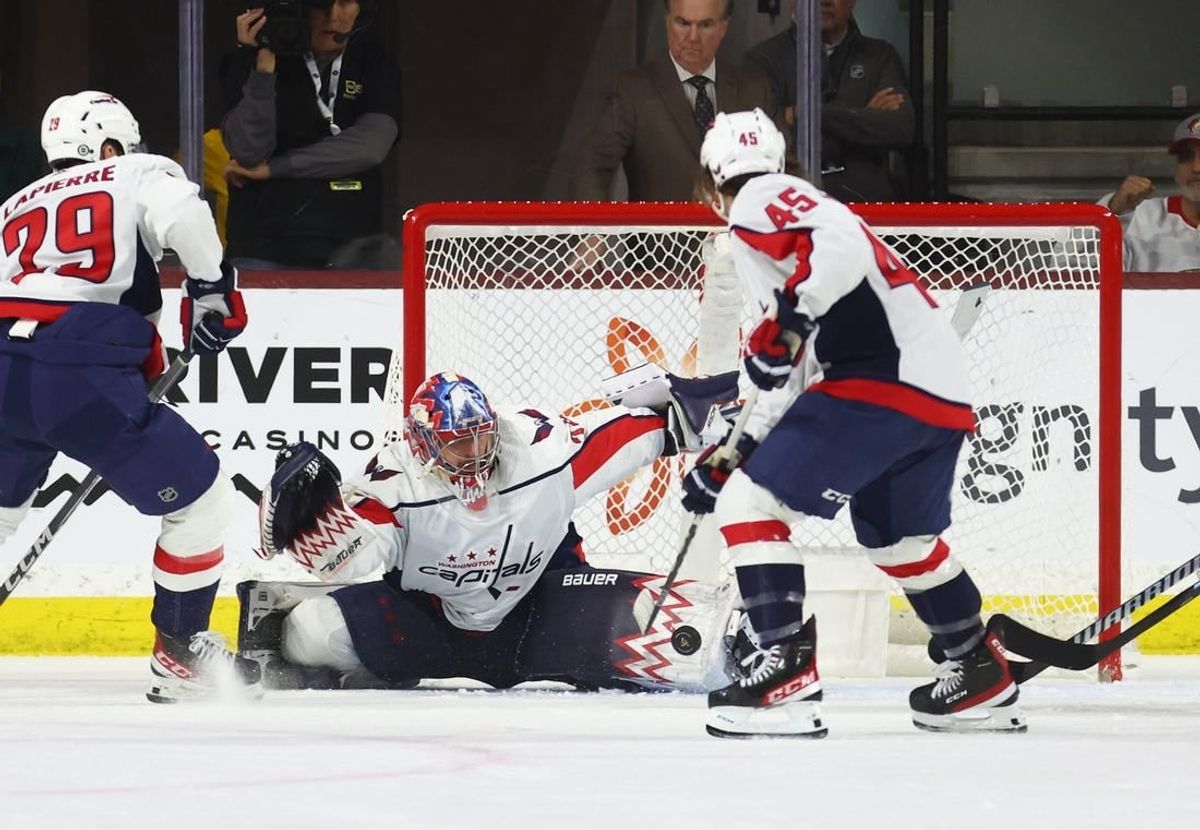 Dec 4, 2023; Tempe, Arizona, USA; Washington Capitals goalie Charlie Lindgren makes a save against the Arizona Coyotes in the third period at Mullett Arena.