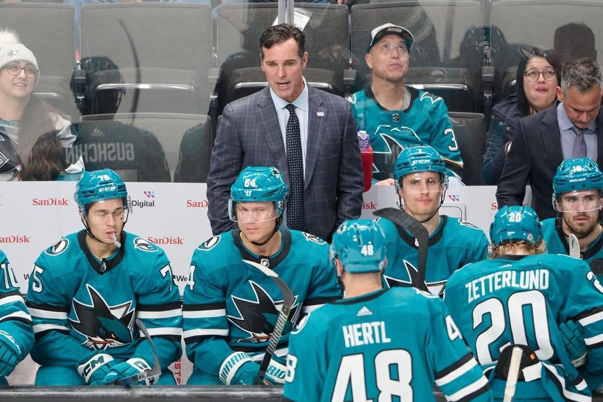 Nov 16, 2023; San Jose, California, USA; San Jose Sharks head coach David Quinn watches the game from the bench against the St. Louis Blues during the third period at SAP Center at San Jose.
