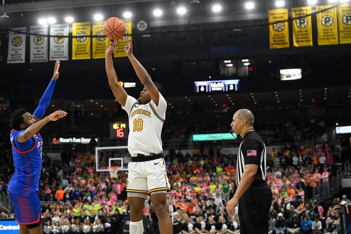 Feb 17, 2024; Providence, Rhode Island, USA; Providence Friars forward Rich Barron (10)  shoots against the DePaul Blue Demons during the first half at Amica Mutual Pavilion.