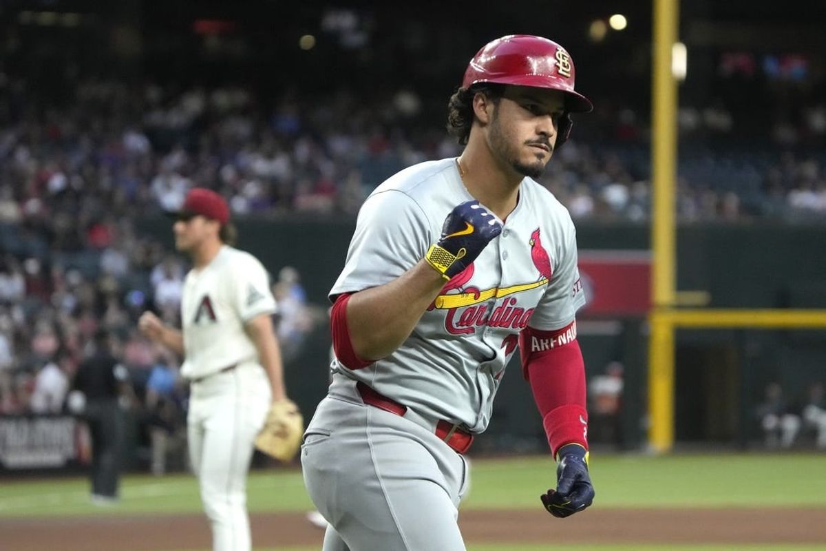 Apr 12, 2024; Phoenix, Arizona, USA; St. Louis Cardinals third base Nolan Arenado (28) pumps his fist after hitting a three run home run against the Arizona Diamondbacks in the first inning at Chase Field.