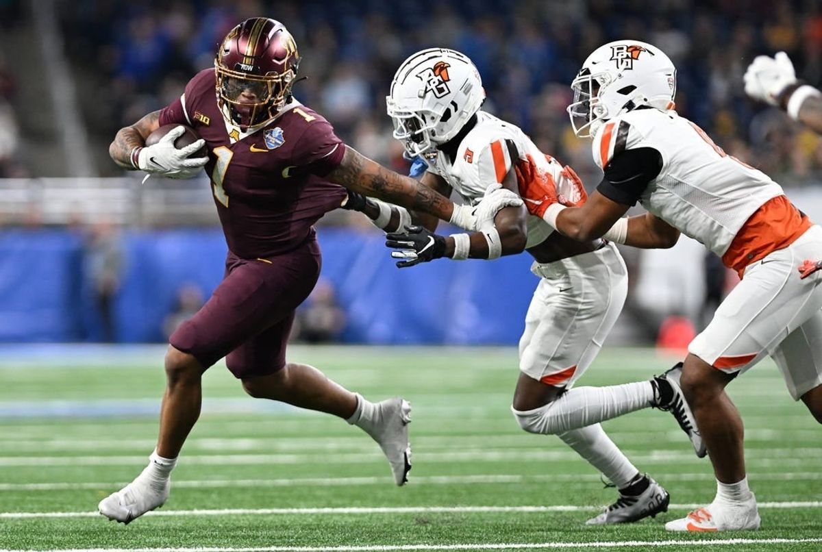 Dec 26, 2023; Detroit, MI, USA;  Minnesota Golden Gophers running back Darius Taylor (1) runs the ball against the Bowling Green Falcons in the first quarter at Ford Field.