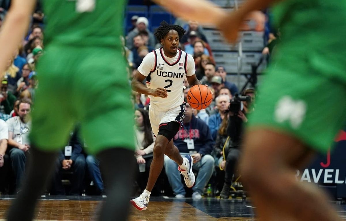 Nov 24, 2023; Hartford, Connecticut, USA; UConn Huskies guard Tristen Newton (2) returns the ball again st the Manhattan Jaspers in the first half at XL Center.