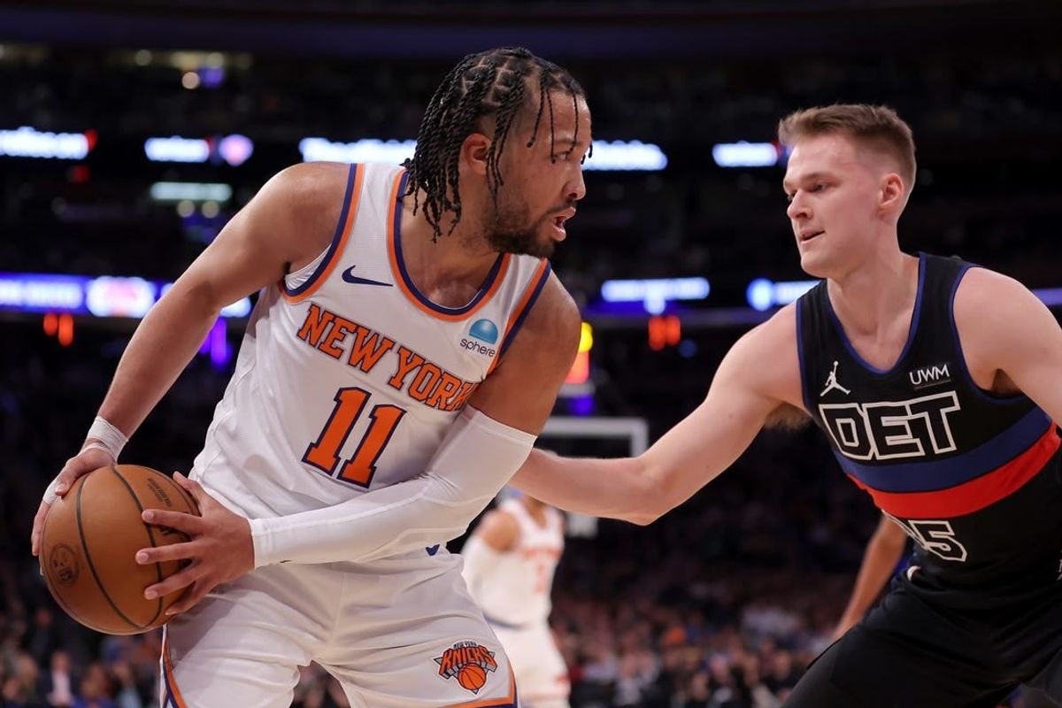 Mar 25, 2024; New York, New York, USA; New York Knicks guard Jalen Brunson (11) controls the ball against Detroit Pistons forward Buddy Boeheim (35) during the second quarter at Madison Square Garden.