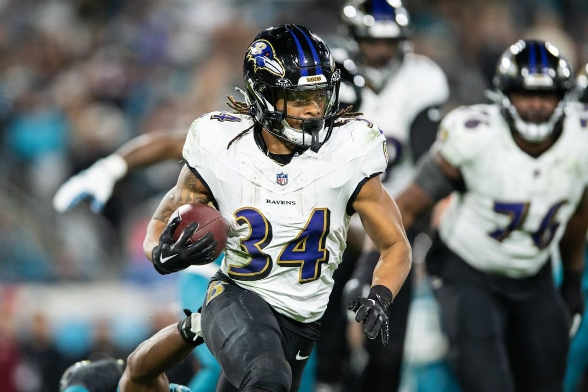 Dec 17, 2023; Jacksonville, Florida, USA; Baltimore Ravens running back Keaton Mitchell (34) runs the ball against the Jacksonville Jaguars in the fourth quarter at EverBank Stadium.