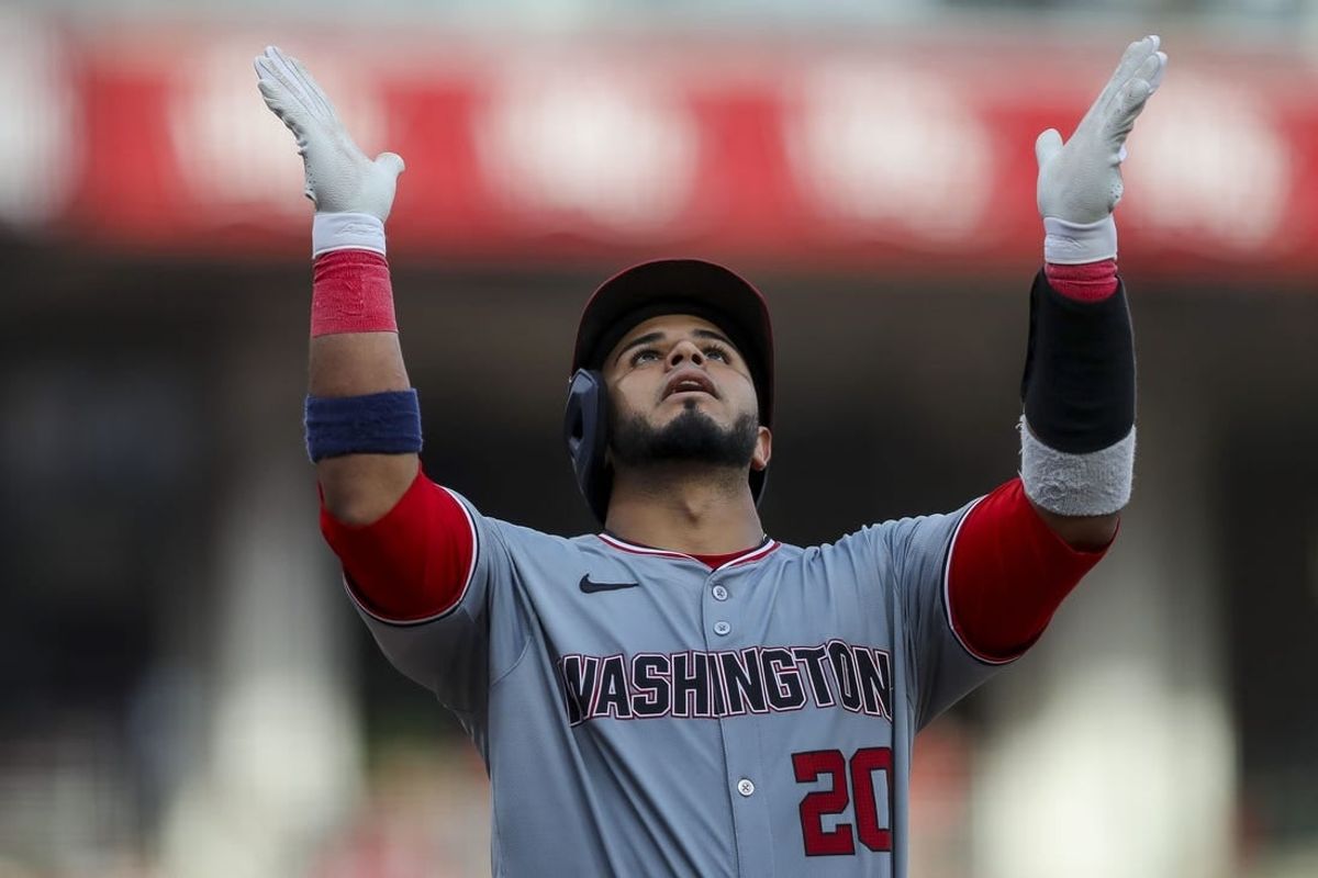 Mar 30, 2024; Cincinnati, Ohio, USA; Washington Nationals catcher Keibert Ruiz (20) reacts after hitting a solo home run in the eighth inning against the Cincinnati Reds at Great American Ball Park.
