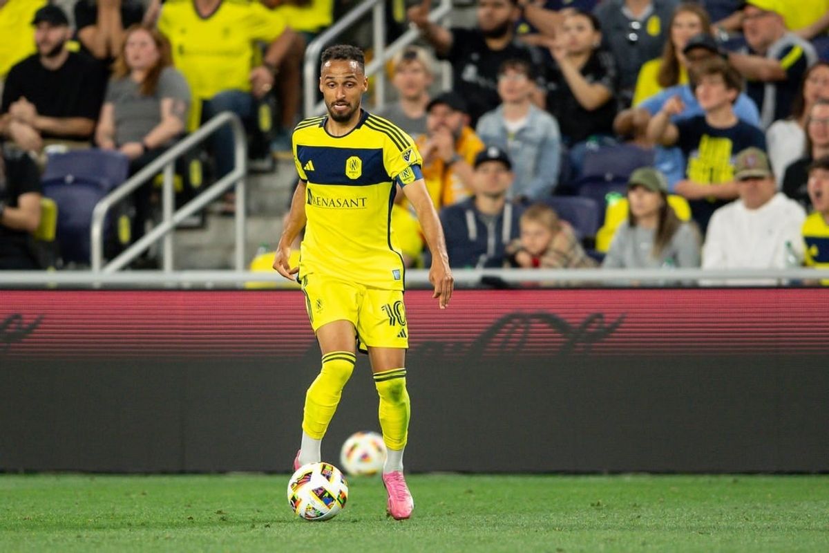 Mar 30, 2024; Nashville, Tennessee, USA;  Nashville SC midfielder Hany Mukhtar (10) dribbles the ball against the Columbus Crew during the second half at Geodis Park.
