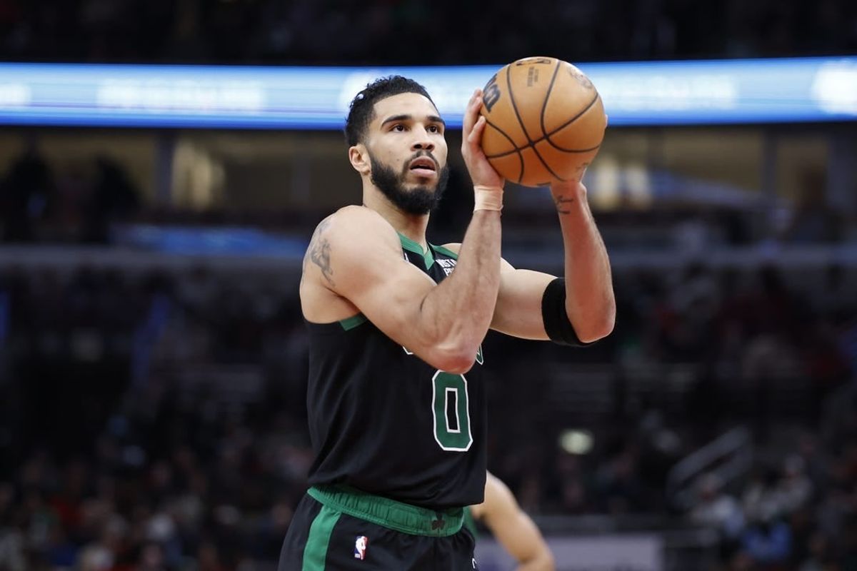 Feb 22, 2024; Chicago, Illinois, USA; Boston Celtics forward Jayson Tatum (0) shoots a free throw against the Chicago Bulls during the second half at United Center.