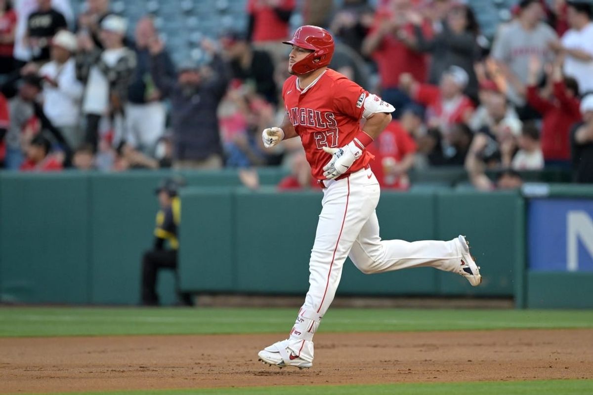 Apr 9, 2024; Anaheim, California, USA;  Los Angeles Angels outfielder Mike Trout (27) rounds the bases after hitting a two run home run in the first inning against the Tampa Bay Rays at Angel Stadium.