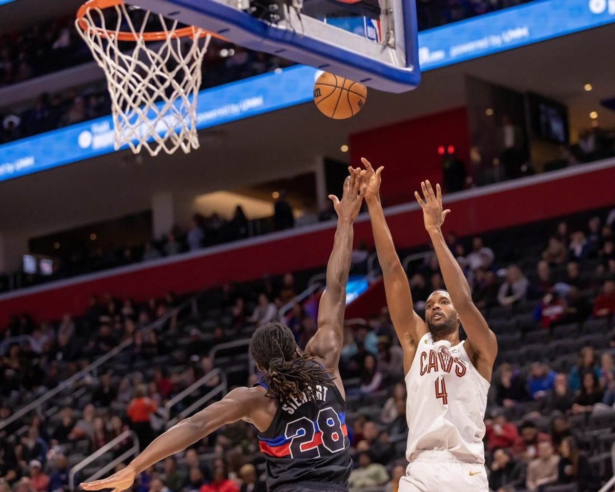 Dec 2, 2023; Detroit, Michigan, USA; Cleveland Cavaliers forward Evan Mobley (4) shoots the ball over Detroit Pistons center Isaiah Stewart (28) during the first half at Little Caesars Arena.