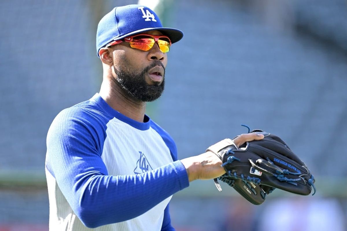 Mar 26, 2024; Anaheim, California, USA;  Los Angeles Dodgers right fielder Jason Heyward (23) warms up prior to the game against the Los Angeles Angels at Angel Stadium.