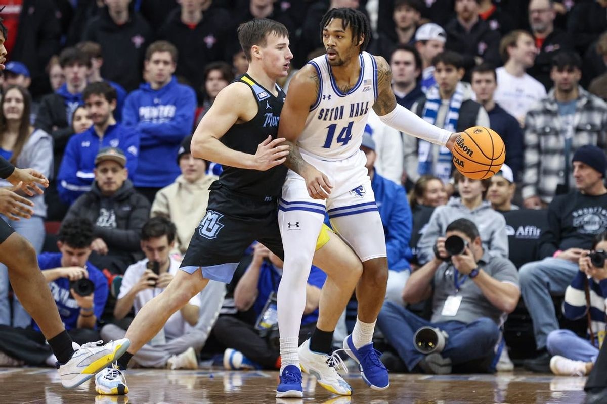 Jan 6, 2024; Newark, New Jersey, USA; Seton Hall Pirates guard Dre Davis (14) dribbles against Marquette Golden Eagles guard Tyler Kolek (11) during the first half at Prudential Center.