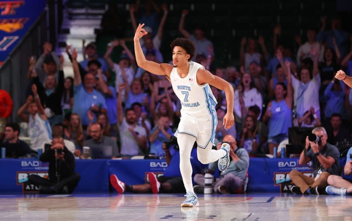 Nov 24, 2023; Paradise Island, BAHAMAS;  North Carolina Tar Heels guard Seth Trimble (7) reacts after scoring during the second half against the Arkansas Razorbacks at Imperial Arena.