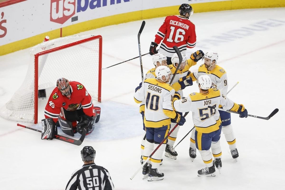 Dec 5, 2023; Chicago, Illinois, USA; Nashville Predators center Ryan O'Reilly (90) celebrates with teammates after scoring against the Chicago Blackhawks during the second period at United Center.