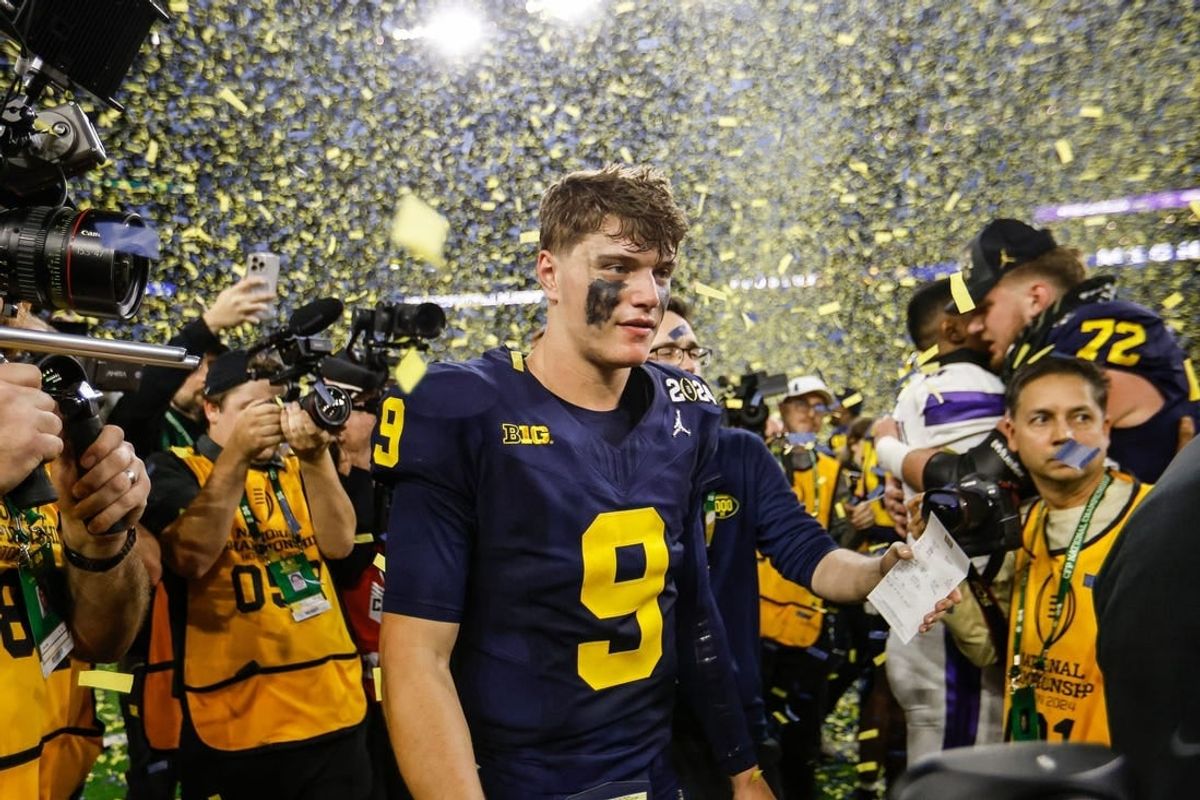 Michigan quarterback J.J. McCarthy celebrates after the 34-13 win over Washington to win the national championship game at NRG Stadium in Houston on Monday, Jan. 8, 2024.