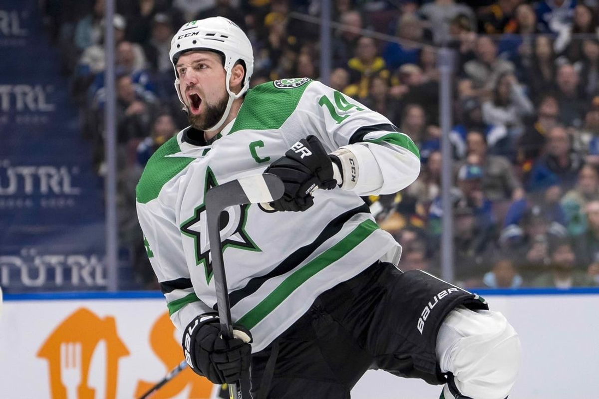 Mar 28, 2024; Vancouver, British Columbia, CAN; Dallas Stars forward Jamie Benn (14) celebrates his goal against the Vancouver Canucks in the third period at Rogers Arena. Dallas won 3 - 1.