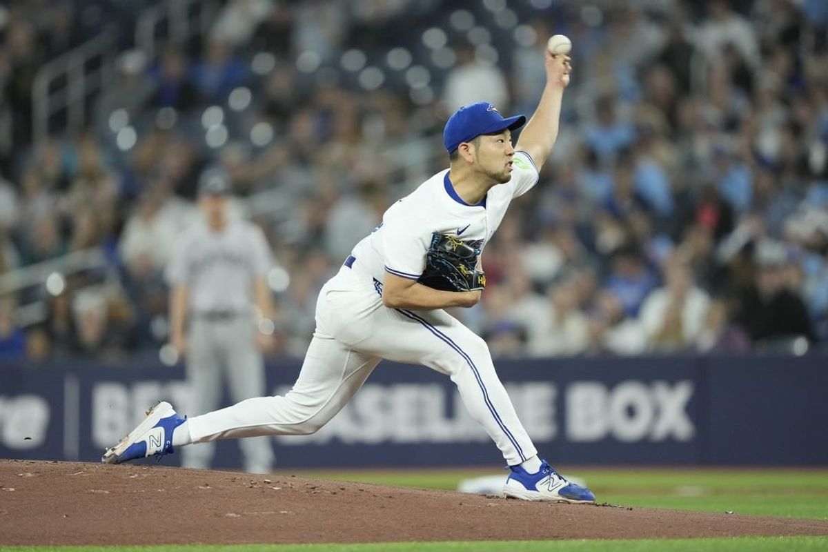 Apr 16, 2024; Toronto, Ontario, CAN; Toronto Blue Jays starting pitcher Yusei Kikuchi (16) pitches to the New York Yankees during the first inning at Rogers Centre.