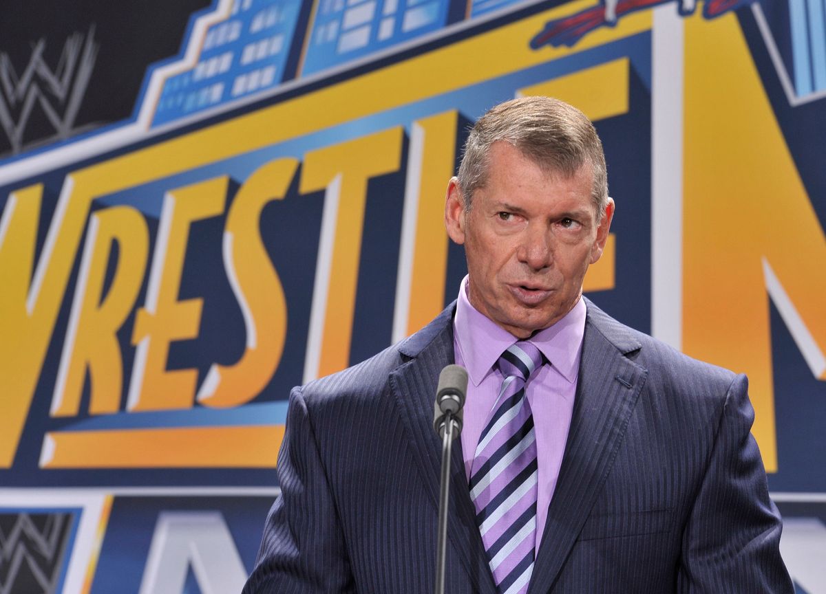 Vince McMahon body slams self.