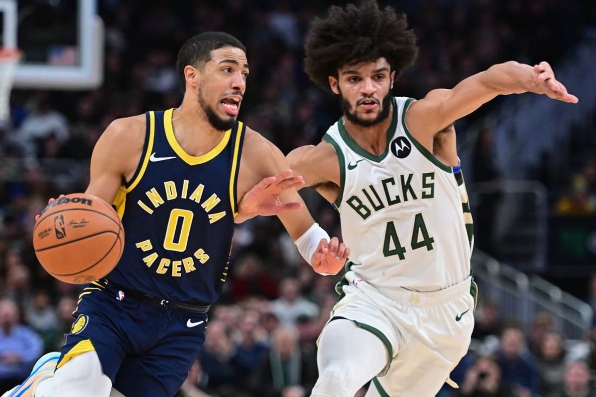 Dec 13, 2023; Milwaukee, Wisconsin, USA;  Indiana Pacers guard Tyrese Haliburton (0) drives for the basket against Milwaukee Bucks guard Andre Jackson Jr. (44) in the second quarter at Fiserv Forum.