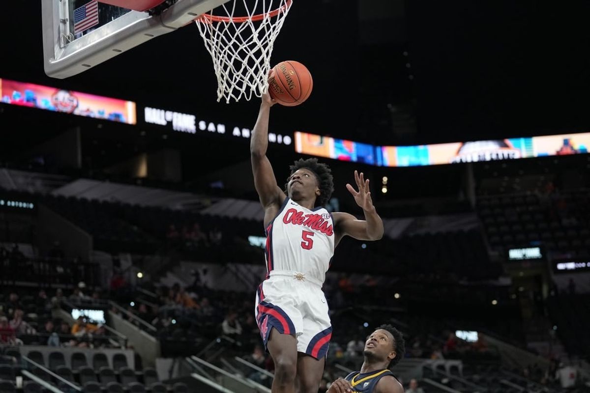 Dec 16, 2023; San Antonio, Texas, USA;  Mississippi Rebels guard Jaylen Murray (5) shoots in the second half against the California Golden Bears at the Frost Bank Center.