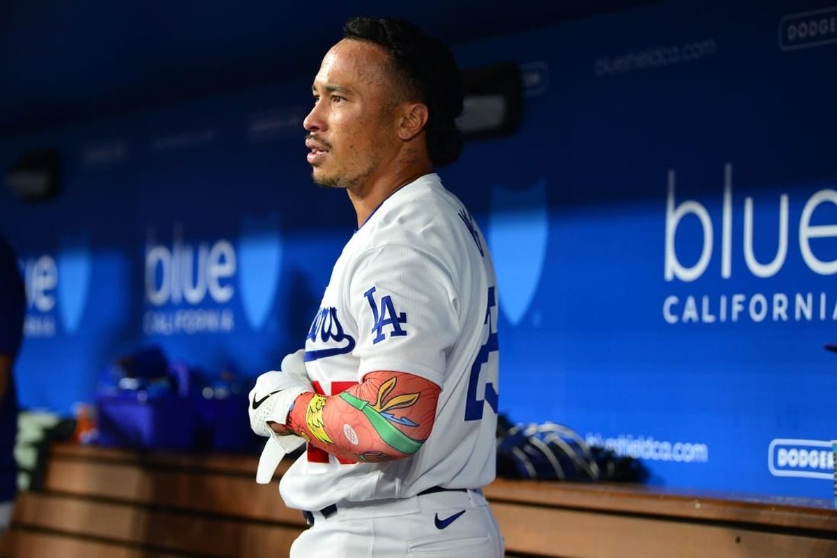 September 1, 2023; Los Angeles, California, USA; Los Angeles Dodgers second baseman Kolten Wong (25) reacts after hitting a three run home run against the Atlanta Braves during the eighth inning at Dodger Stadium.