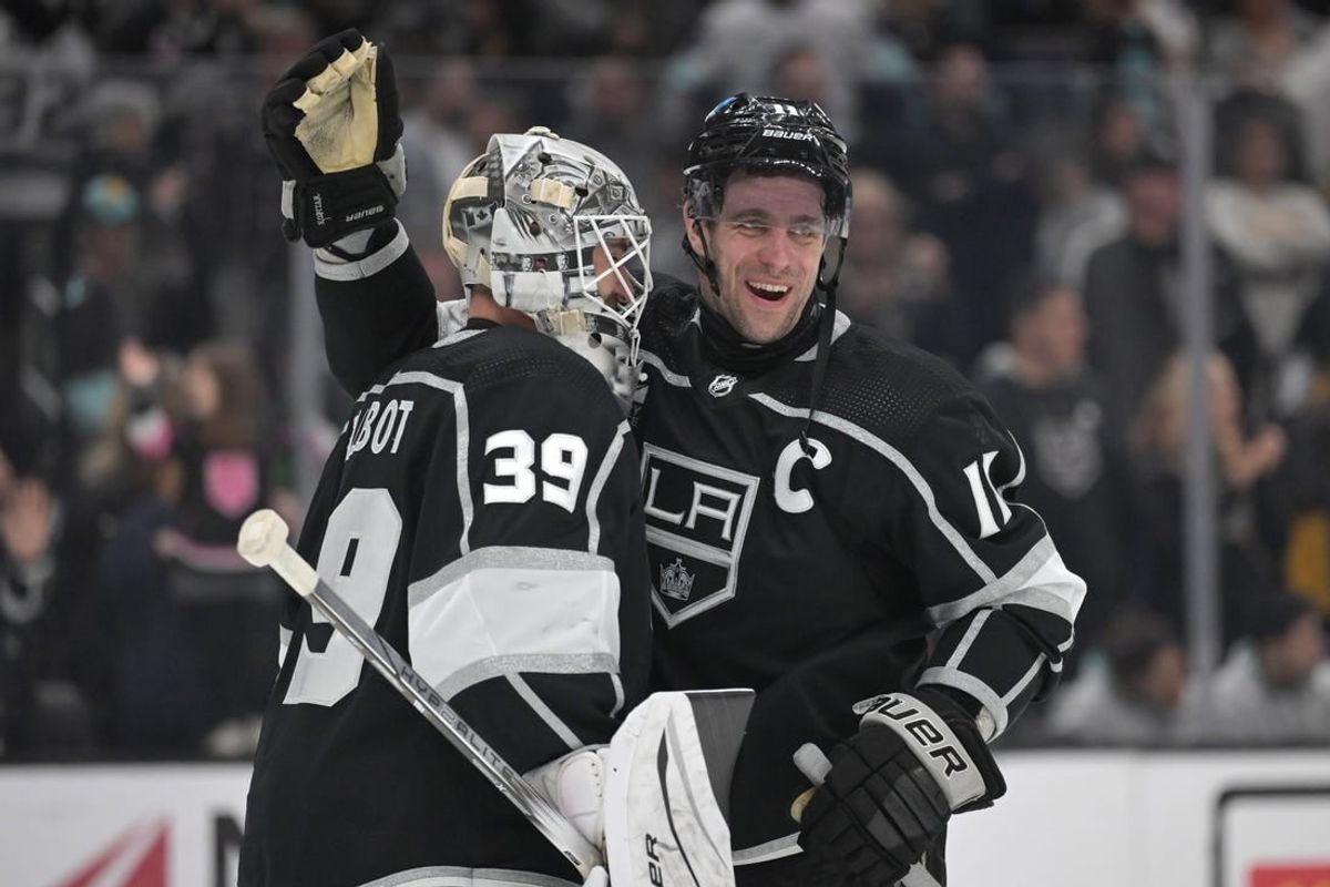 Apr 3, 2024; Los Angeles, California, USA; Los Angeles Kings goaltender Cam Talbot (39) is congratulated by center Anze Kopitar (11) after defeating the Seattle Kraken 5-2 at Crypto.com Arena.