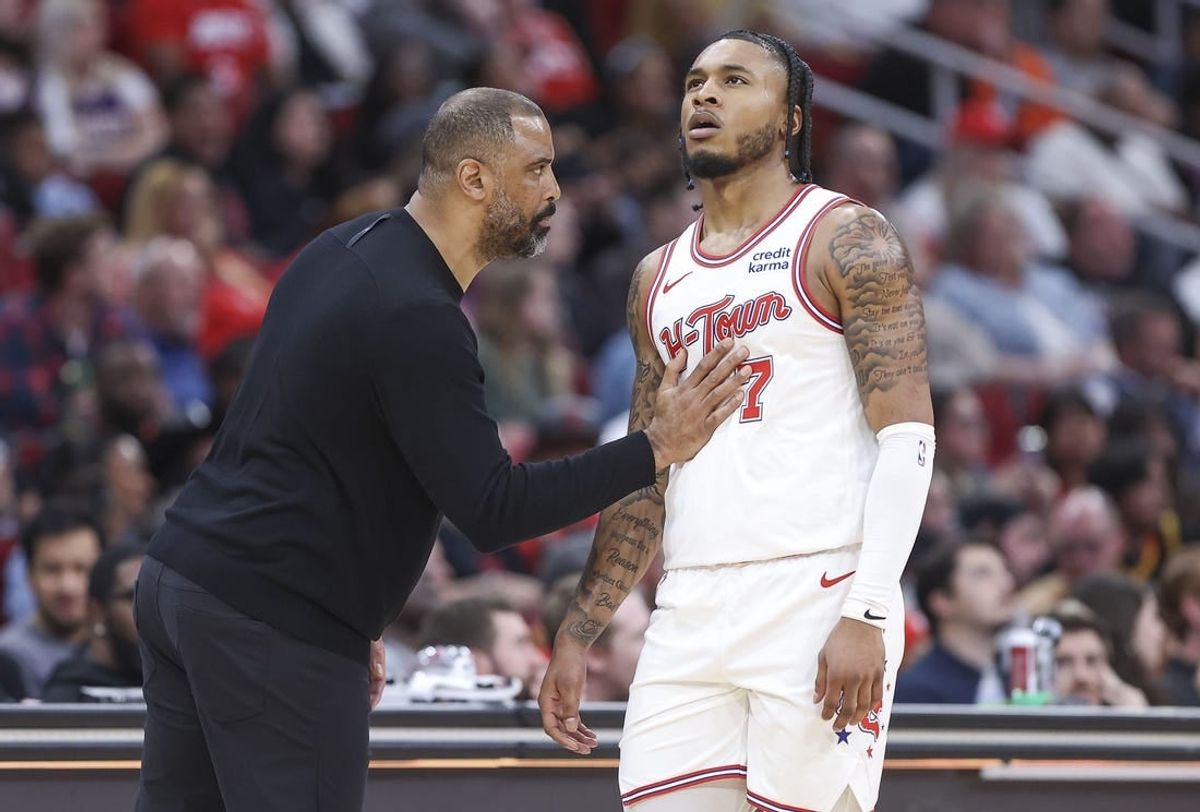 Feb 23, 2024; Houston, Texas, USA; Houston Rockets head coach Ime Udoka talks with forward Cam Whitmore (7) during the third quarter against the Phoenix Suns at Toyota Center.
